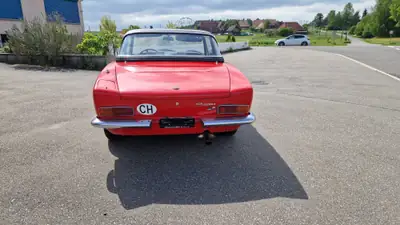 FIAT 124 Spider 1969 — Roadster classique rouge, 12 600 km d'exception — Heckansicht