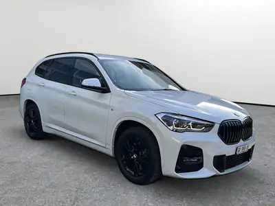 BMW X1 xDrive 20d M Sport — SUV compact diesel performant, entretien complet — side view