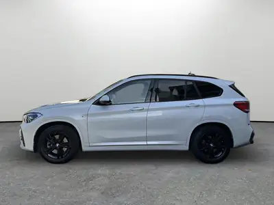 BMW X1 xDrive 20d M Sport — SUV compact diesel performant, entretien complet — rear view