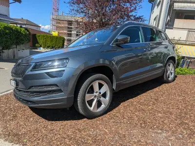 Skoda Karoq 1.6 TDI — SUV compact fiable, sans sinistre, faible consommation — side view