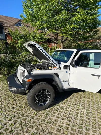 Jeep Wrangler 2.0 Un120 PHEV Unlimited — SUV hybride rechargeable, 14'000 km seulement — tableau de bord