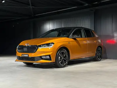 Skoda Fabia 1.0 TSI Monte Carlo DSG — Citadine dynamique orange, garantie 5 ans — intérieur