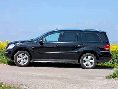 Mercedes-Benz GL 350 V6 CDI BlueTec — 7 places, diesel performant, 138000 km — côté