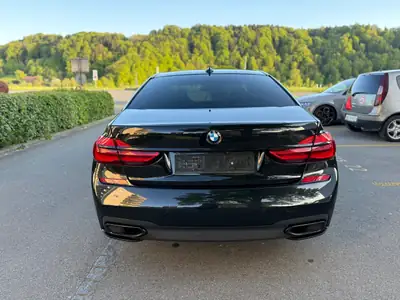 BMW 740d xDrive — Berline de prestige diesel, état impeccable et équipement complet — rear view