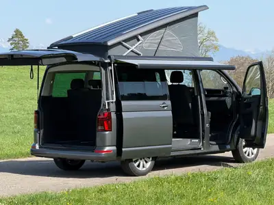 VW T6.1 California Beach — Camping-car 4x4 premium, batterie auxiliaire intégrée — fianco