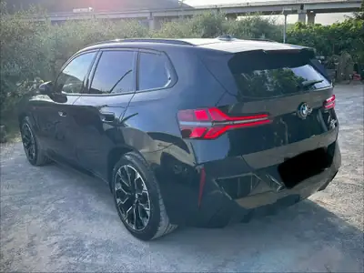 BMW X3 20i xDrive 48V M Sport Pro — SUV performant, hybride léger et garantie BMW — vista posteriore