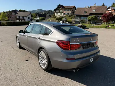 BMW 530 Gran Turismo 530d — Berline spacieuse, motorisation diesel robuste — fianco