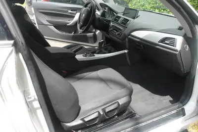 BMW 116i — Citadine compacte fiable, 120'000 km, transmission manuelle — Seitenansicht