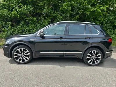 VW Tiguan 2.0 TDI SCR Highline 4Motion — SUV compact robuste, 240 ch, 4×4 intelligent — fianco