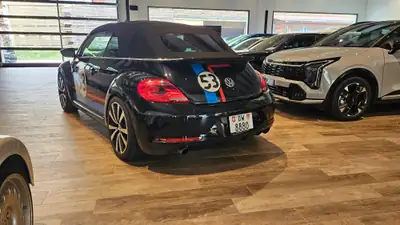 VW Beetle Cabrio 2.0 TSI Sport — Décapotable iconique, 211 ch dynamiques et design rétro-moderne — Thumbnail 13