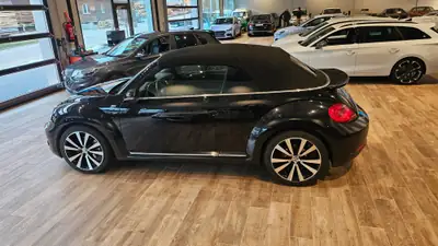 VW Beetle Cabrio 2.0 TSI Sport — Décapotable iconique, 211 ch dynamiques et design rétro-moderne — Thumbnail 30