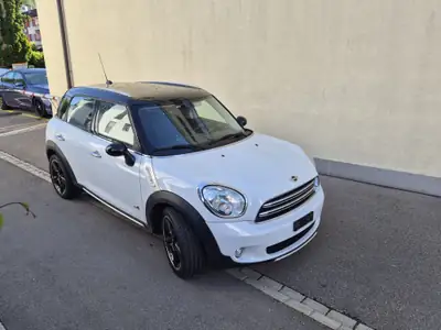 MINI Countryman 1.6i Cooper ALL4 — Polyvalence compacte et motricité intégrale — côté