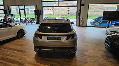 Hyundai Tucson 1.6 TGDI PHEV N-Line 4WD — SUV hybride rechargeable, 20 km, Pannodach — Thumbnail 12