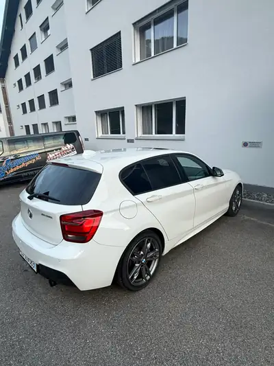 BMW M135i xDrive F20 — Sportive compacte 2013, transmission automatique — côté