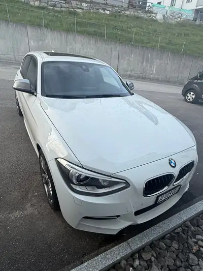 BMW M135i xDrive F20 — Sportive compacte 2013, transmission automatique — vue extérieure