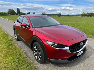 Mazda CX-30 2.0 180 Revolution AWD — Compact SUV hybride, garantie et contrôle technique frais — vue extérieure