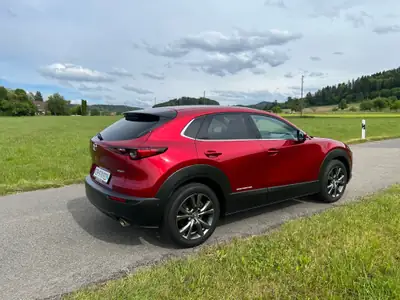 Mazda CX-30 2.0 180 Revolution AWD — Compact SUV hybride, garantie et contrôle technique frais — arrière