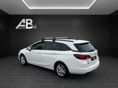 Opel Astra Sports Tourer 1.2 Turbo 145 ch — Break spacieux, frais d'entretien réduits — rear view