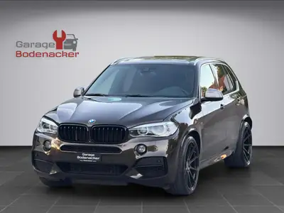 BMW X5 xDrive M50d — SUV 7 places, 381 ch diesel, M Sport et basses suspensions — side view