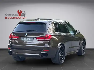 BMW X5 xDrive M50d — SUV 7 places, 381 ch diesel, M Sport et basses suspensions — dashboard