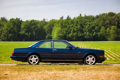 Bentley Continental R 1997 — Coupé sportif de prestige, motorisation 6.8L biturbo, version européenne rare — Heckansicht
