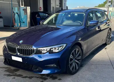 BMW 330d Touring Steptronic Individual — Break diesel performant, kilométrage ultra-faible — côté