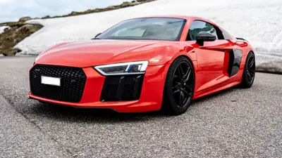 Audi R8 5.2 FSI V10 plus — Supercar allemande, 610 ch purs — vista esterna