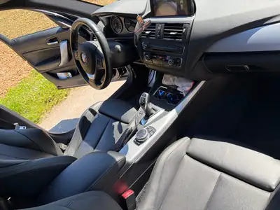 BMW M135i xDrive 2014 — Berline sportive 319 ch, transmission intégrale — tableau de bord