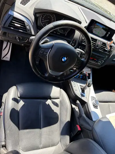 BMW M135i xDrive 2014 — Berline sportive 319 ch, transmission intégrale — intérieur