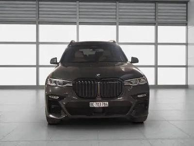BMW X7 xDrive 40d — SUV 7 places premium, moteur hybride 48V, entretien à jour — side view