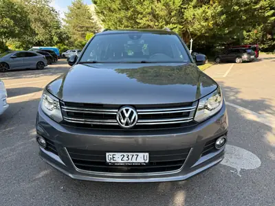 VW Tiguan 2.0 TDI Cityscape 4Motion — SUV polyvalent, toit panoramique, full équipé — fianco