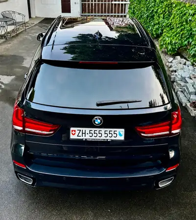 BMW X5 40d xDrive — SUV premium diesel, équipement M-Sport complet, première main suisse — arrière