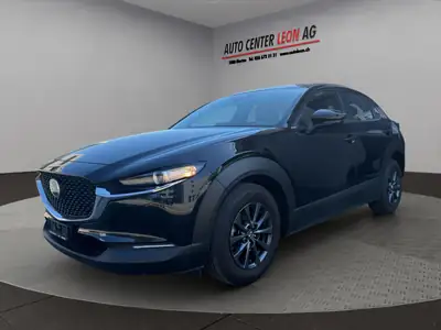 Mazda CX-30 SKYACTIV-G 122 M Hybrid — Compact urbain économe et fiable — side view