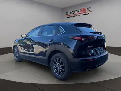 Mazda CX-30 SKYACTIV-G 122 M Hybrid — Compact urbain économe et fiable — interior