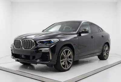 BMW X6 M50d — SUV coupé musclé, 400 ch diesel, équipement complet — arrière