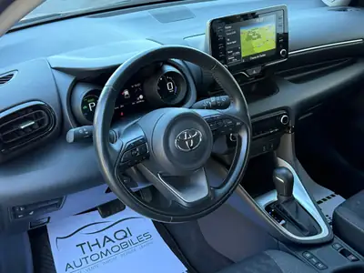 Toyota Yaris 1.5 Premium e-CVT — Hybride économe, premier propriétaire suisse — Miniatura 14