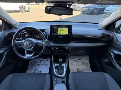Toyota Yaris 1.5 Premium e-CVT — Hybride économe, premier propriétaire suisse — Miniatura 20