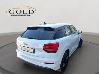Audi Q2 35 TFSI S-Line — Compact SUV dynamique, entretien certifié — side view