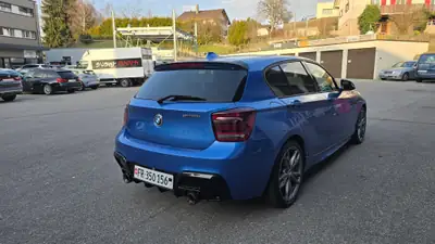 BMW M135i xDrive 2014 — Berline sportive 320 ch, transmission intégrale — Heckansicht