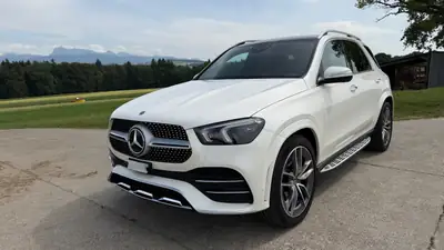 Mercedes-Benz GLE 400d 4MATIC — SUV premium 7 places, 330 PS, design blanc immaculé — côté