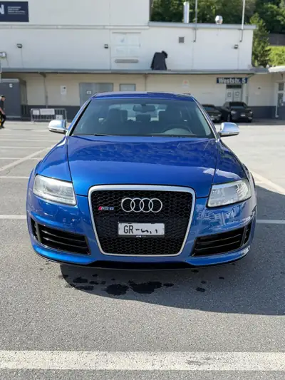 Audi RS6 5.0 V10 TFSI Quattro — Berline sportive légendaire, moteur Lamborghini — Seitenansicht