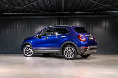 Fiat 500X 1.3 TB Cross — SUV urbain polyvalent, 38 200 km seulement — side view