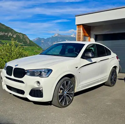 BMW X4 M40i — SUV coupé sportif, 360 ch et seulement 86 000 km — side view