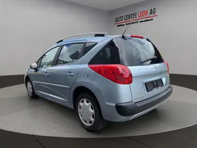 Peugeot 207 SW 1.6 16V Sport Automatic — Break spacieux, climatisation automatique et toit panoramique — interior