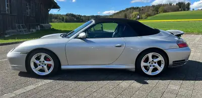 Porsche 911 Carrera 4S 3.6 — Cabriolet légendaire, 320 ch et transmission manuelle — rear view