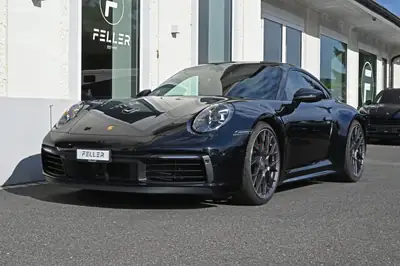 Porsche 911 Carrera 4S PDK — Icône sportive 450 ch, direction arrière et châssis actif — side view