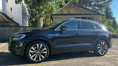 Volkswagen Touareg 4.0 V8 TDI — Prestige et Performance, Comme Neuf — Heckansicht