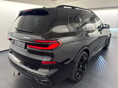 BMW X7 xDrive 48 M60i M Sport Pro — SUV 7 places premium, très faible kilométrage — rear view