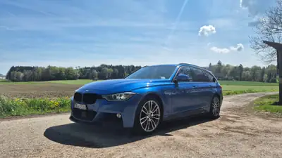 BMW 335d xDrive — Break diesel performant, 313 ch et transmission intégrale — côté