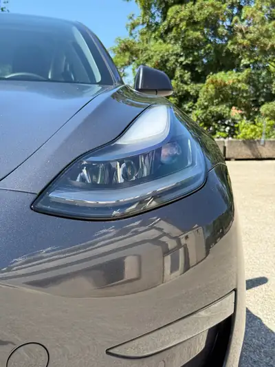 Tesla Model 3 Long Range Dual Motor AWD — Électrique haute performance, batterie garantie jusqu'à 2029 — rear view